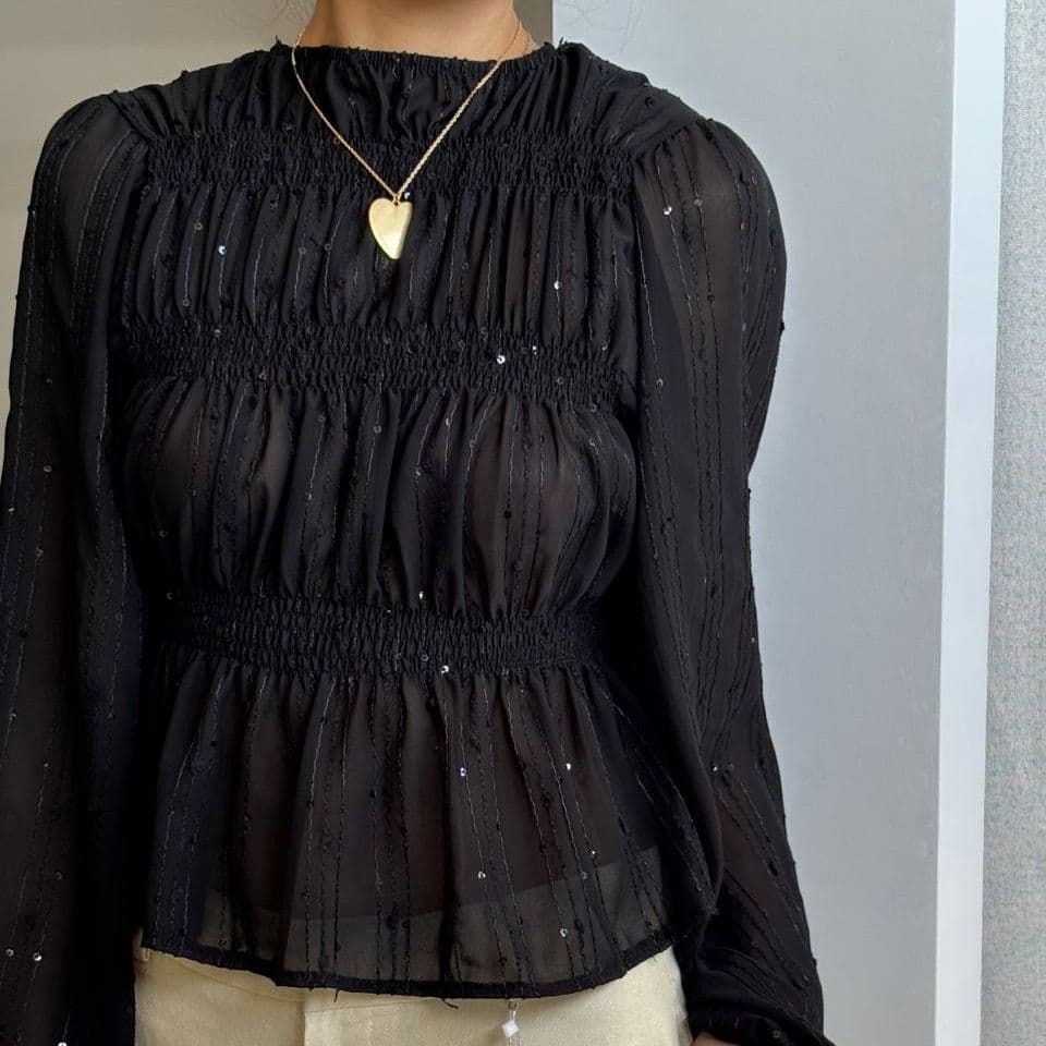 Blusa mangas largas de tul y brillos