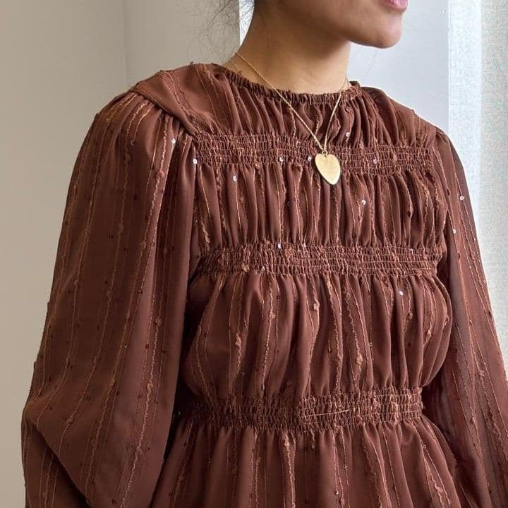 Blusa mangas largas de tul y brillos